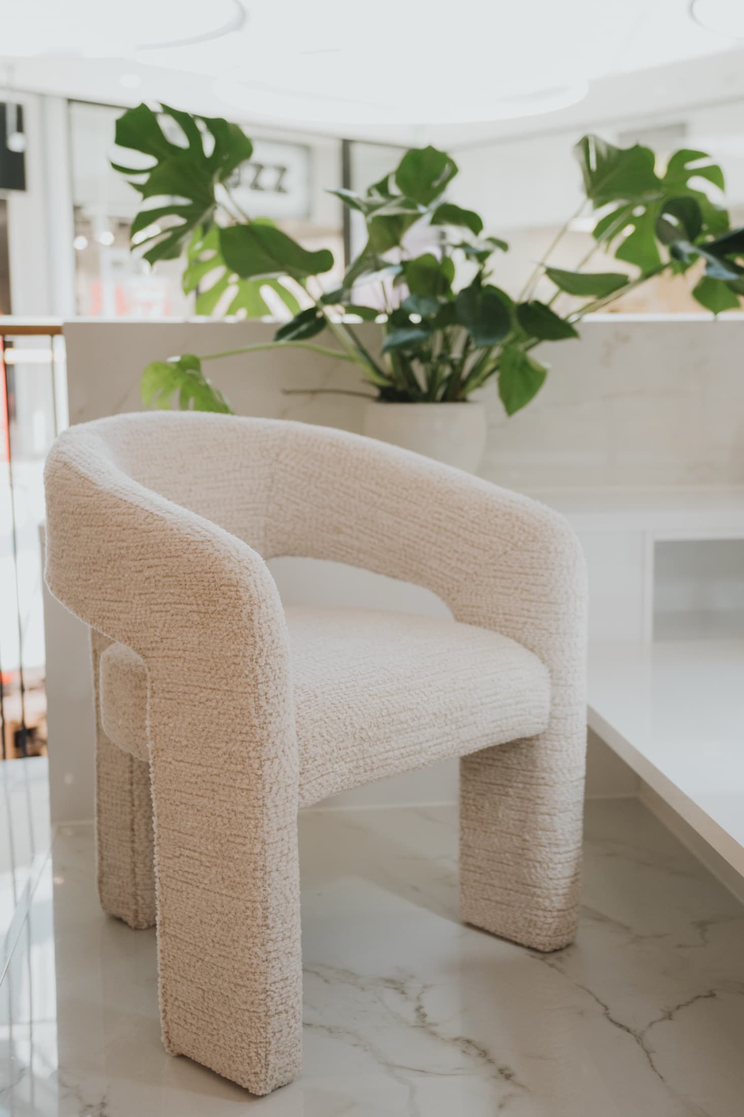 Armchair and greenery at Bell'ami Nail Bar in MaxCity